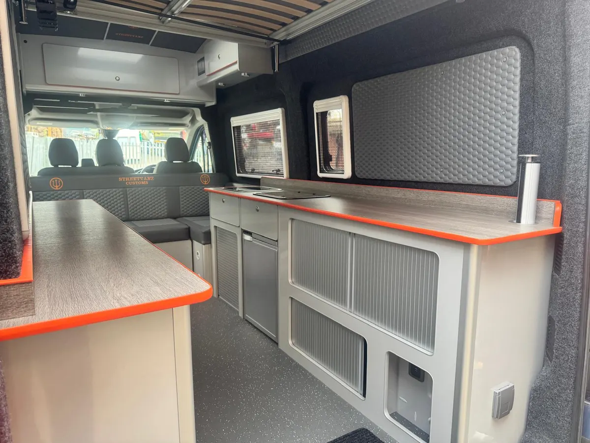Wide view of the finished campervan living space