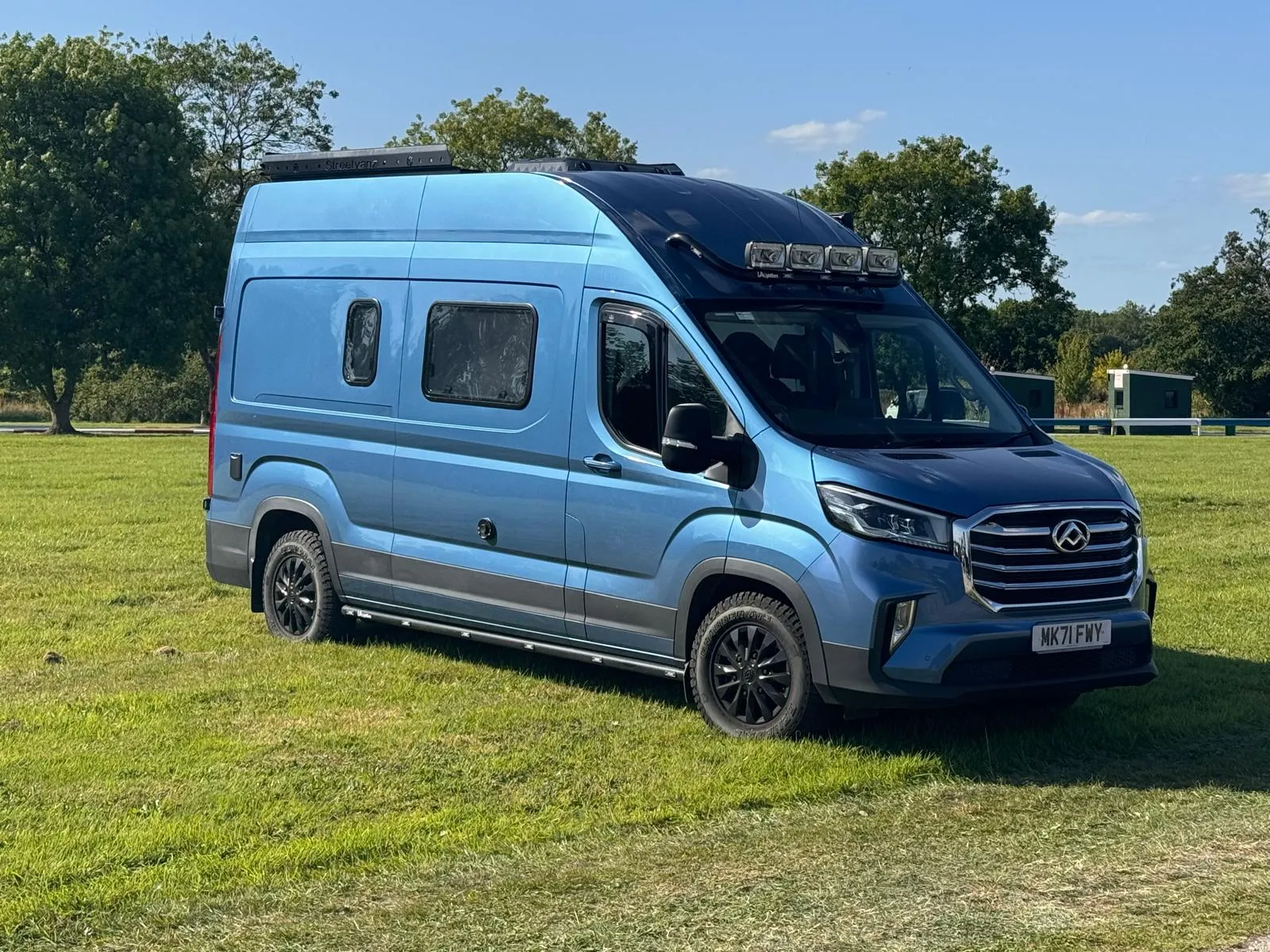 Completed blue campervan built by StreetVanz