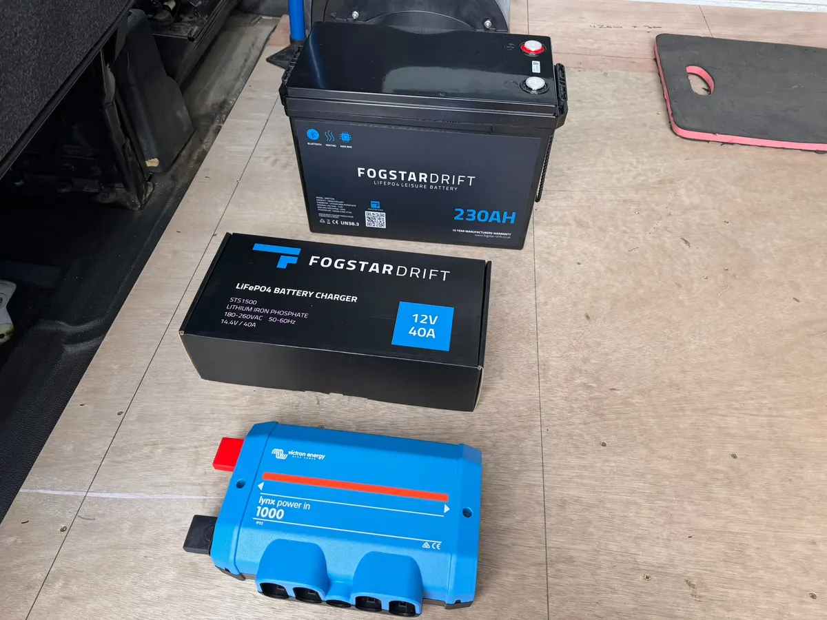 Fogstar battery and Victron electrical components prepared for a campervan system