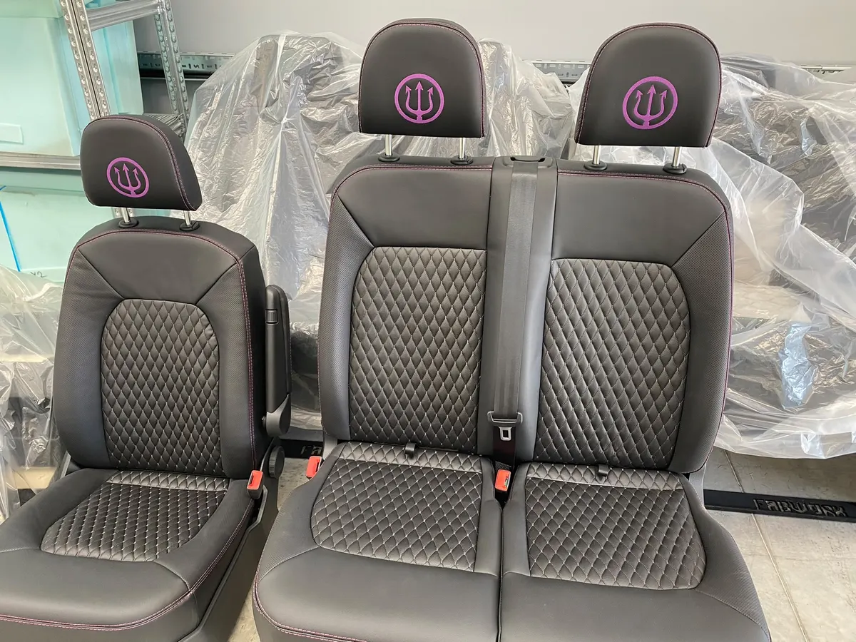 Freshly upholstered black and purple campervan seats