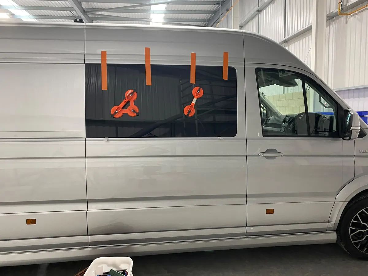 Campervan side window being fitted in the StreetVanz workshop